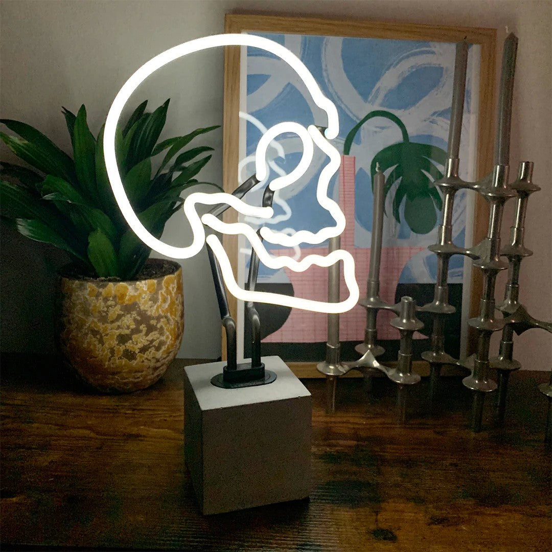 Neon light decoration on concrete base "Skull"