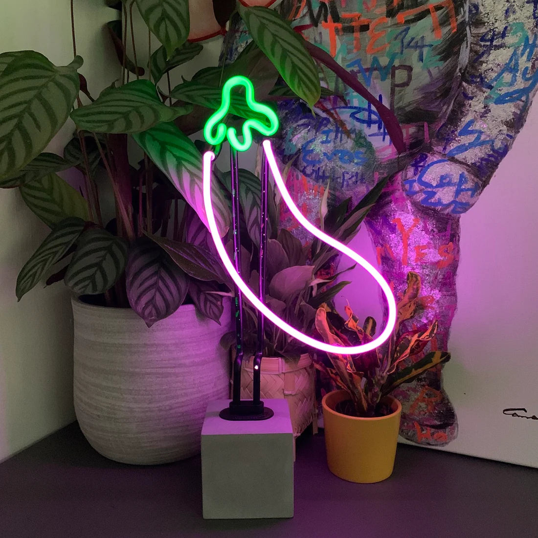 Neon light decoration on concrete base "Aubergine"